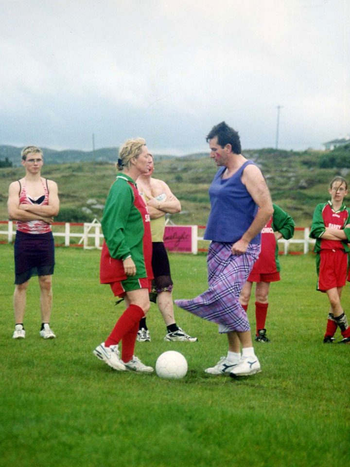 Daniel and Majella playing in a charity football match